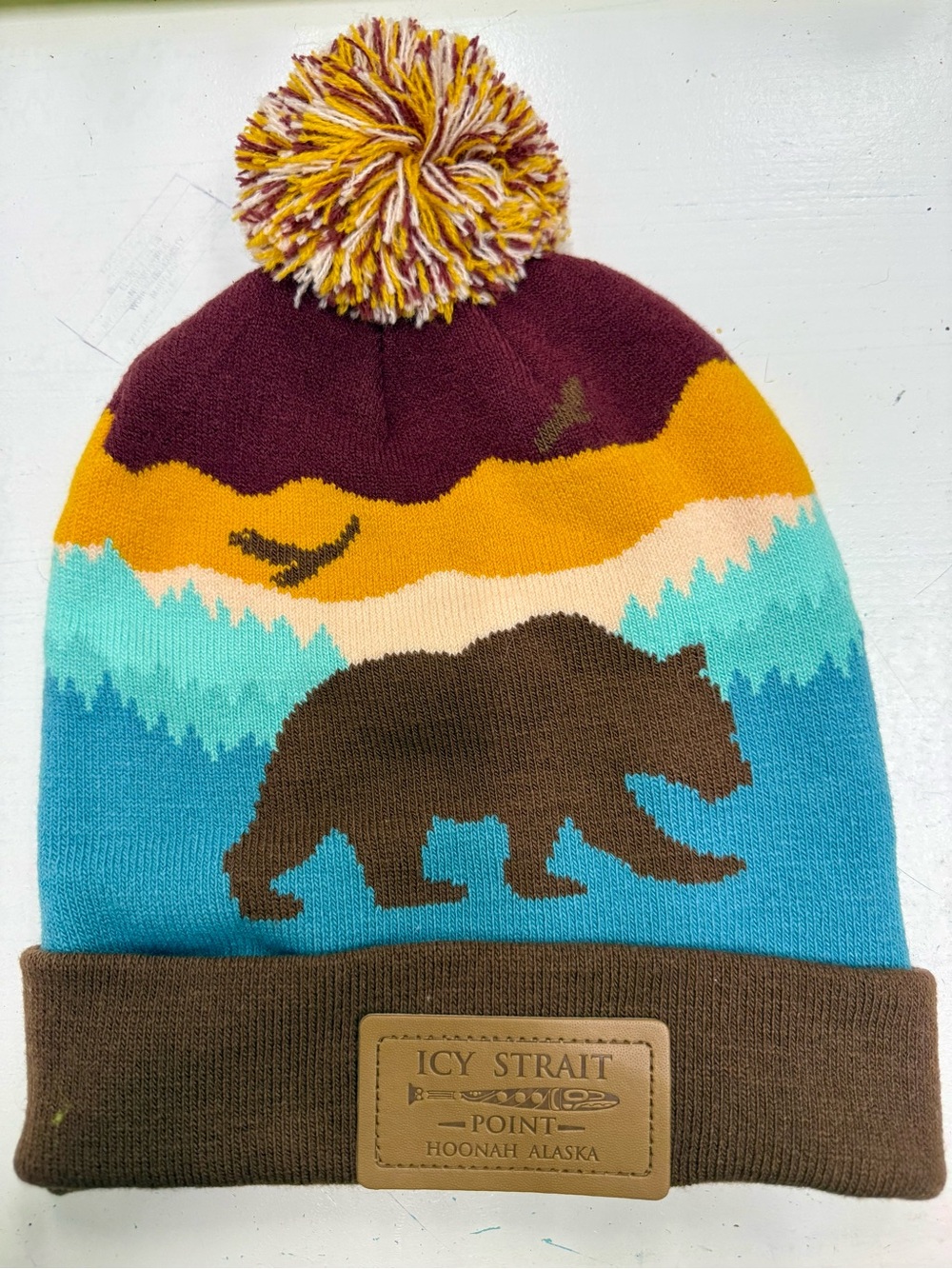 Icy Strait Point Bear Pom Beanie - Brown/Turquoise/Maroon
